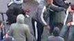 watch London riots: bleeding boy robbed by passers-by -