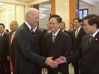 Joe Biden y Xi Jinping se saludan
