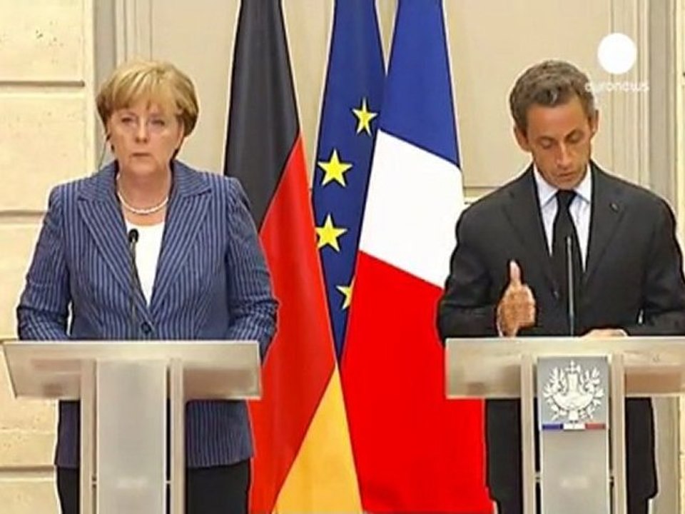 Sarkozy, Merkel urge closer euro economic governance