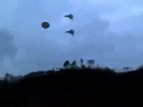 Two Fighter Jets Escorting UFO