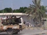 Jubilant Libyan Rebels Take Gaddafi Compound