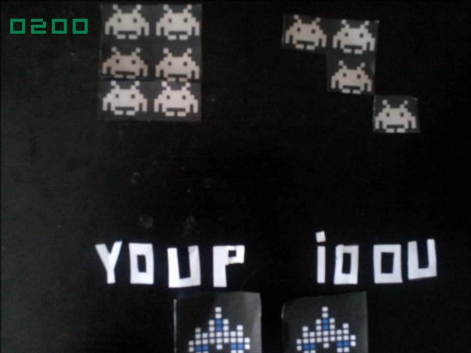 PGW Concours Vidéo Space invaders sur un bureau