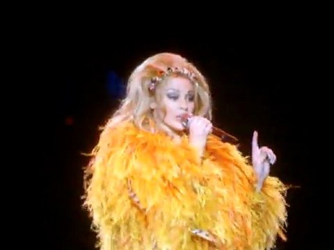 Kylie Minogue talking with fans at stage - les folies tour 2011
