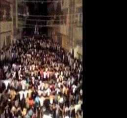 Thousands pack Syrian streets to protest Assad