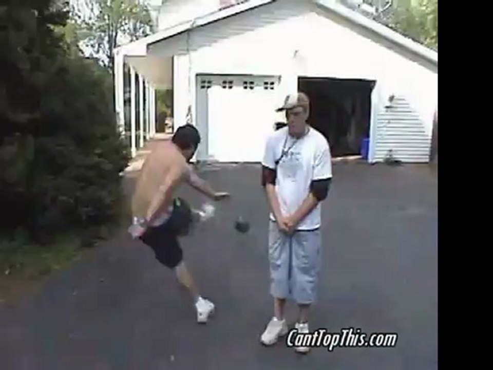 Guy gets hit in head with soccer ball