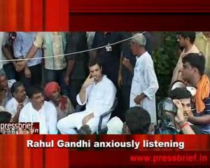 Rahul Gandhi anxiously listening