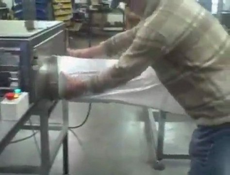Foam winder and semi-automatic bag loader