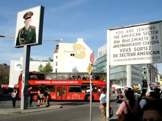 US flag at Berlin's Checkpoint Charlie at half-mast