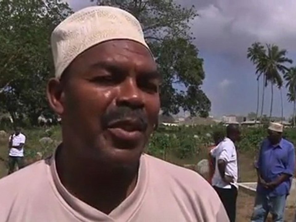 Relatives bury ferry victims, ask safety questions.