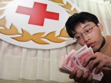 Shanghai Fire Victims Claim Compensation Money was Embezzled
