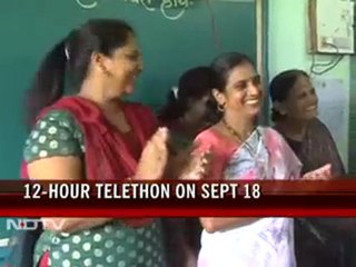 Nita Ambani teaches students at a Mumbai school
