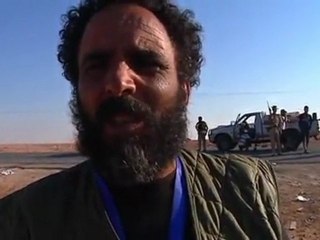 Fighters surround holdout Libyan town