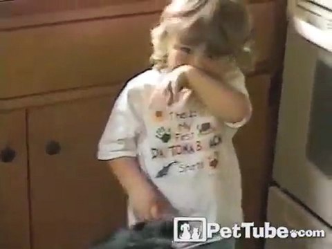 Toddler Treats Dog to a Snack