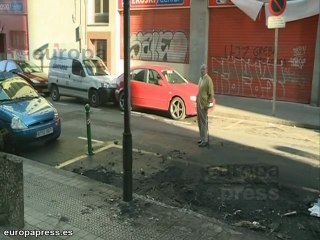 Detienen a tres personas por quemar contenedores