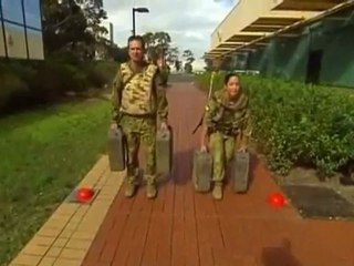 Australia ends ban on women in combat