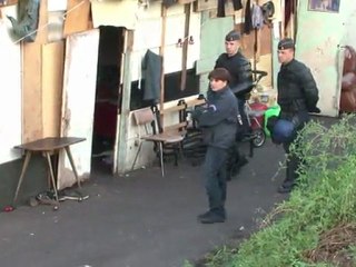 French police round up Roma at illegal camp
