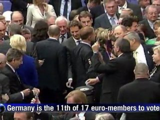 Euro fund bill passes German test with large majority