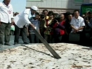 Huge Chinese Pizza Enjoyed by Hundreds