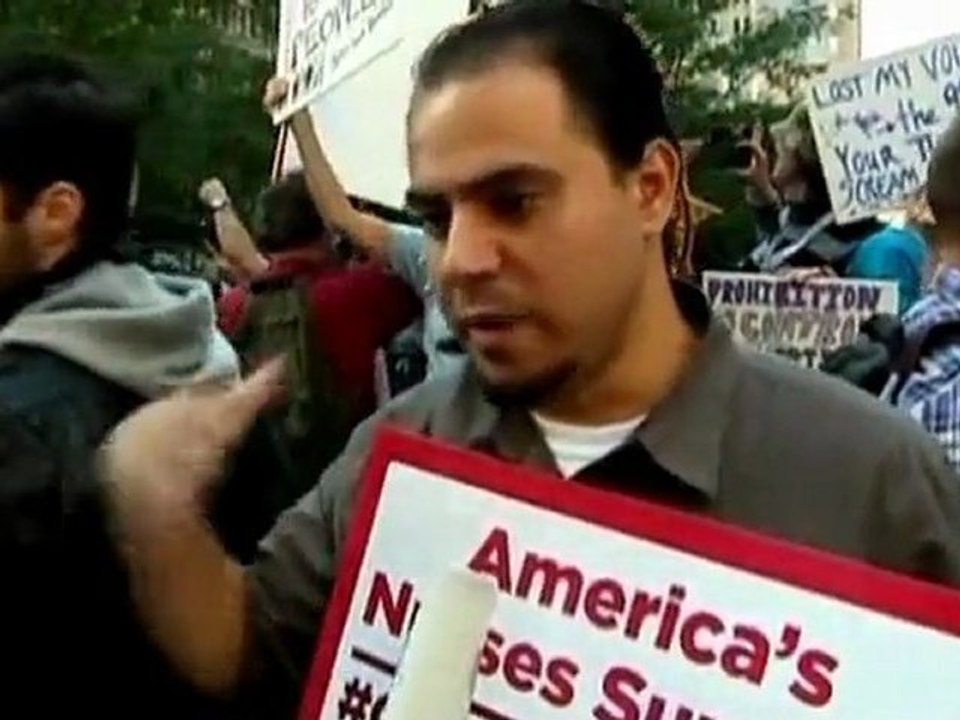 Protestors denounce Wall Street "greed".