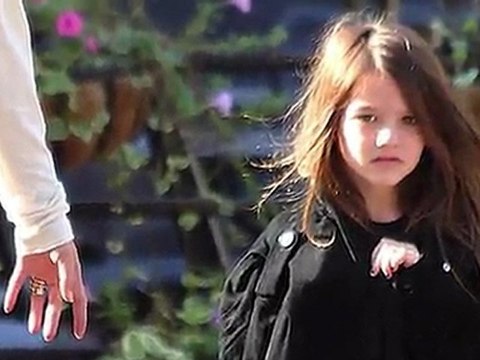 Suri Cruise Hides in Mom's Coat