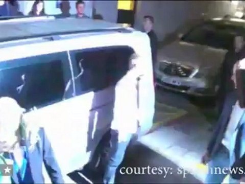 Lady Gaga signs autographs while sporting a weird head piece