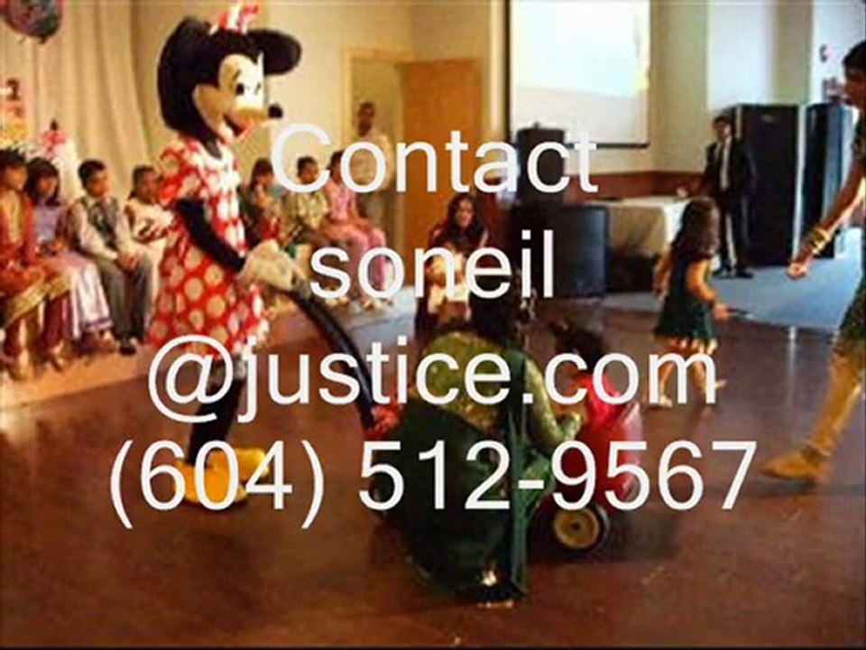 Lighting crew makes Vancouver Elmo mascot a big hit at Indian banquet hall dance floor