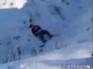 Snowboarder breaks both of his legs.