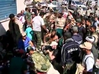 Battle wounds and prayers in Libya