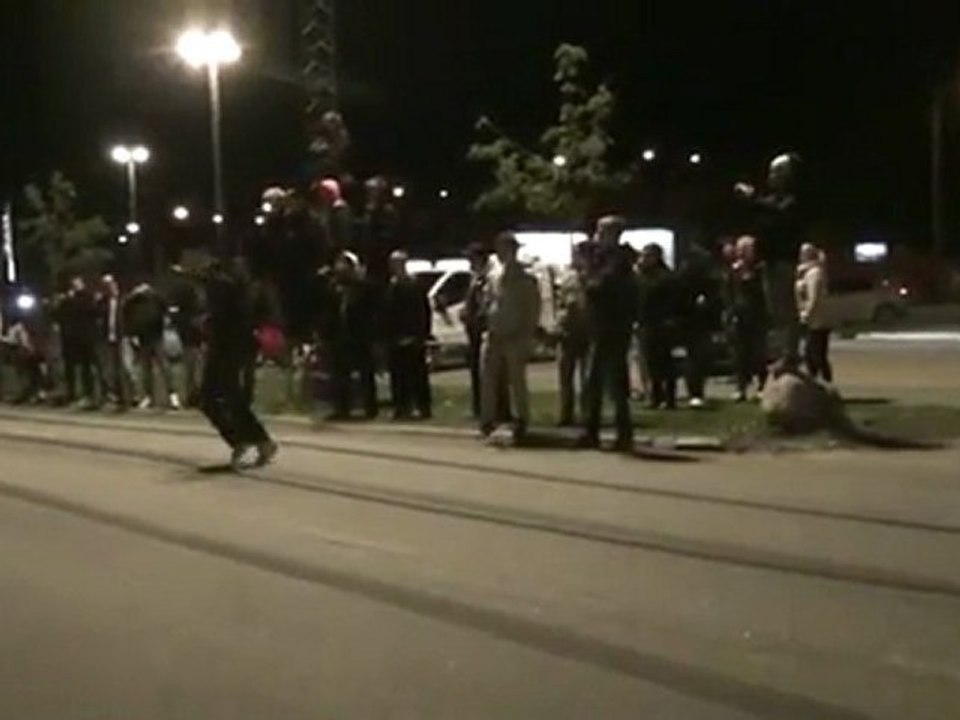 Crazy man jumps over Lamborghini