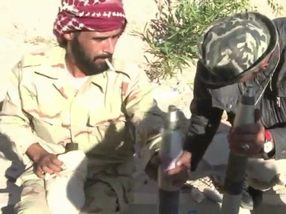 Libya fighters battle pro-Kadhafi snipers in Sirte