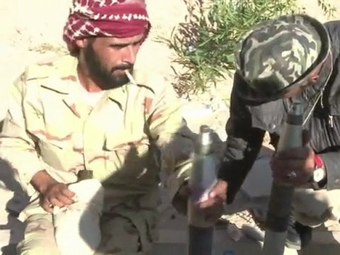 Libya fighters battle pro-Kadhafi snipers in Sirte