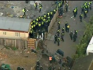 DALE FARM: Police pull down barricades