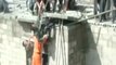 Caught on camera: Dramatic rescue of man dangling from roof of 3-storey building