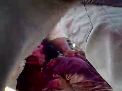 Libyans celebrate over Kadhafi corpse