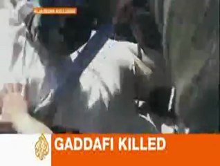 Kaddafi'nin Cesedini Sokakta Sürüklediler (+18)