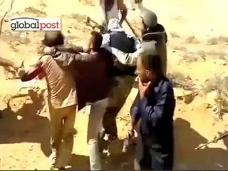 Images exclusives de la capture de Mouammar Kadhafi