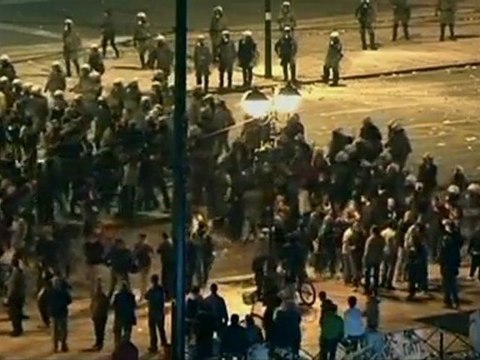 Greek vote passes, protests continue