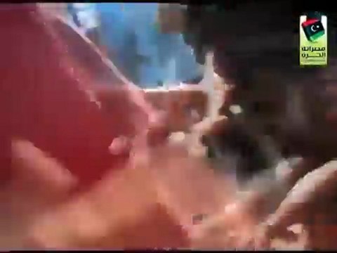 Shocking footage !!! Muammar Gaddafi Last Moments - He is dragged to a truck and killed