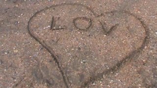 LOVE-LETTERS in the sand