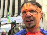 'Superhero' protesters take on Wall Street