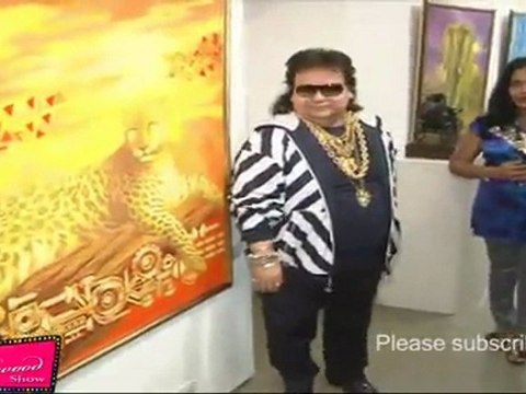 Bappi Lahiri Observes Paintings At Exhibition