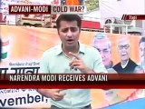 Advani enters Gujarat; shares stage with Modi