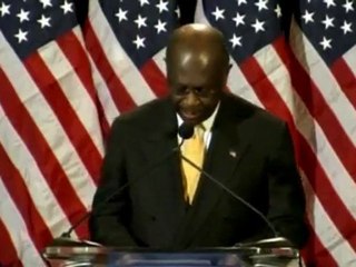 Herman Cain vows to stay in the race