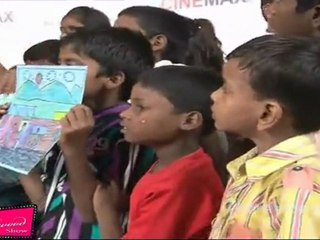 Small Children Display Boards Saying "Stop Global Warming"