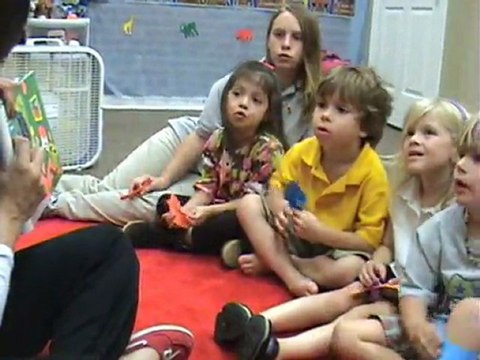 Children listening a Spanish story 1