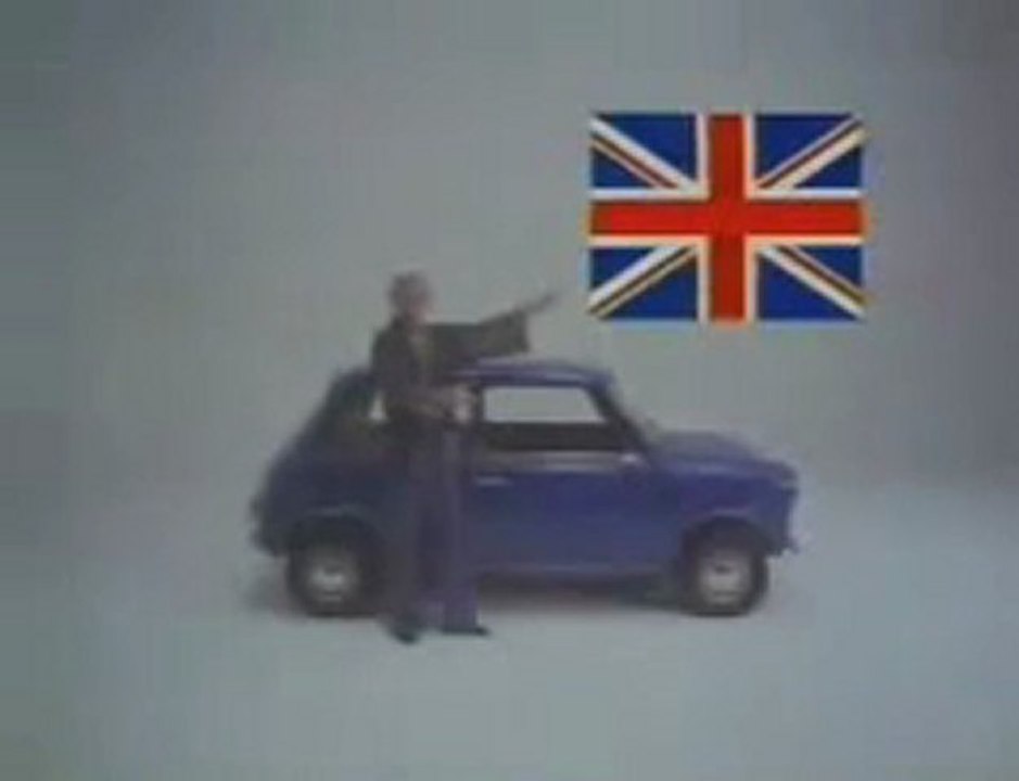Publicité Austin Mini "Drive the Flag" - Spike Milligan - 70's