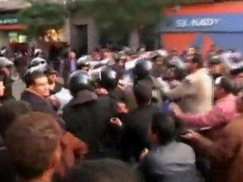 Protesters set fire to police truck