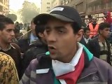 Tense truce holds in Cairo’s Tahrir Square but clashes elsewhere