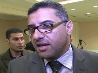 Libya says to integrate 50,000 anti-Kadhafi fighters