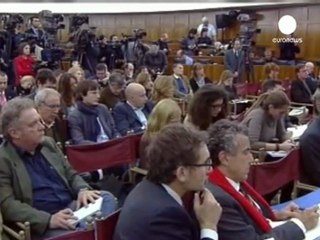 Italy minister breaks down announcing austerity plans